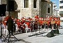 the town band playing outside St Lazarus church