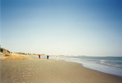flying kites on the beach in Cyprus, Dec 2000