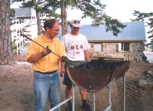 Richard and a home educating friend manning the barbecue on Troodos