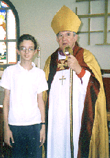 Timothy with the Bishop when he was confirmed in St Helena's Anglican church