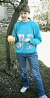 Sue with a lemon in our garden in Cyprus