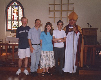 family with the bishop after Tim's confirmation
