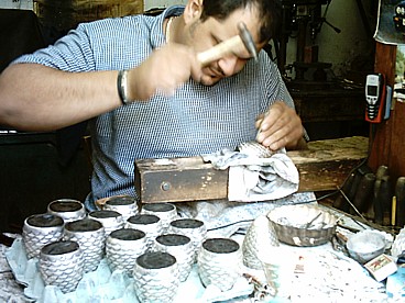 A man hammering silver in Lefkara