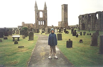 Tim in St Andrews, by the ruined Cathedral in the rain