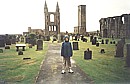Tim by the ruins of St Andrews Cathedral in Scotland