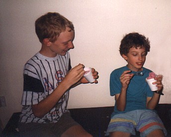 Daniel and Tim enjoy yogurt ice-creams